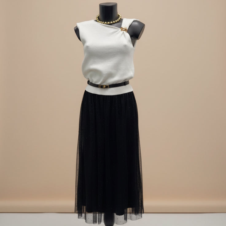 Maglia asimmetrica con dettaglio