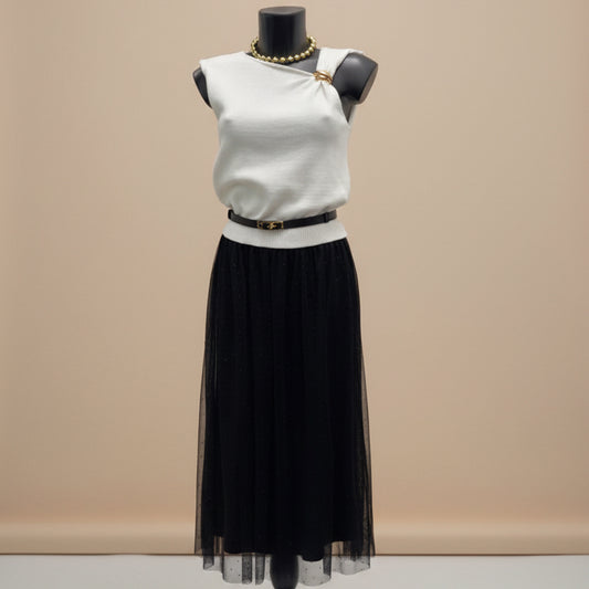 Maglia asimmetrica con dettaglio