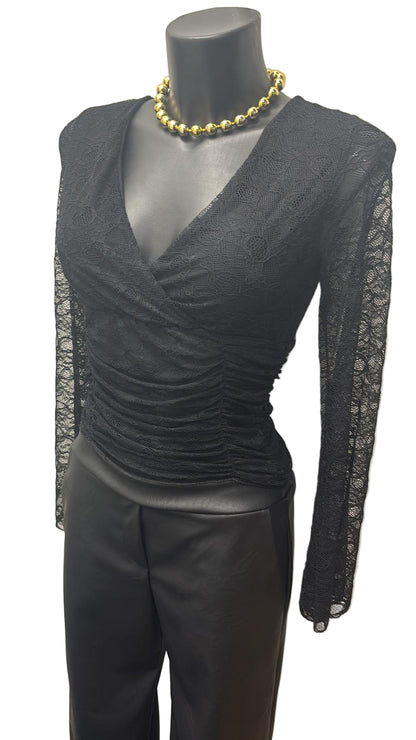 Maglia in pizzo con maniche a campana