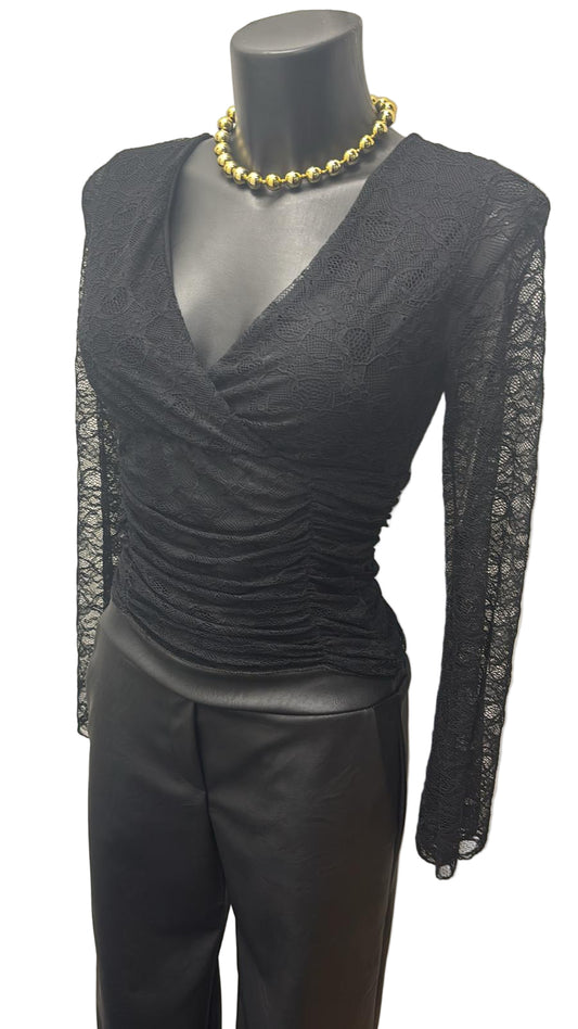 Maglia in pizzo con maniche a campana