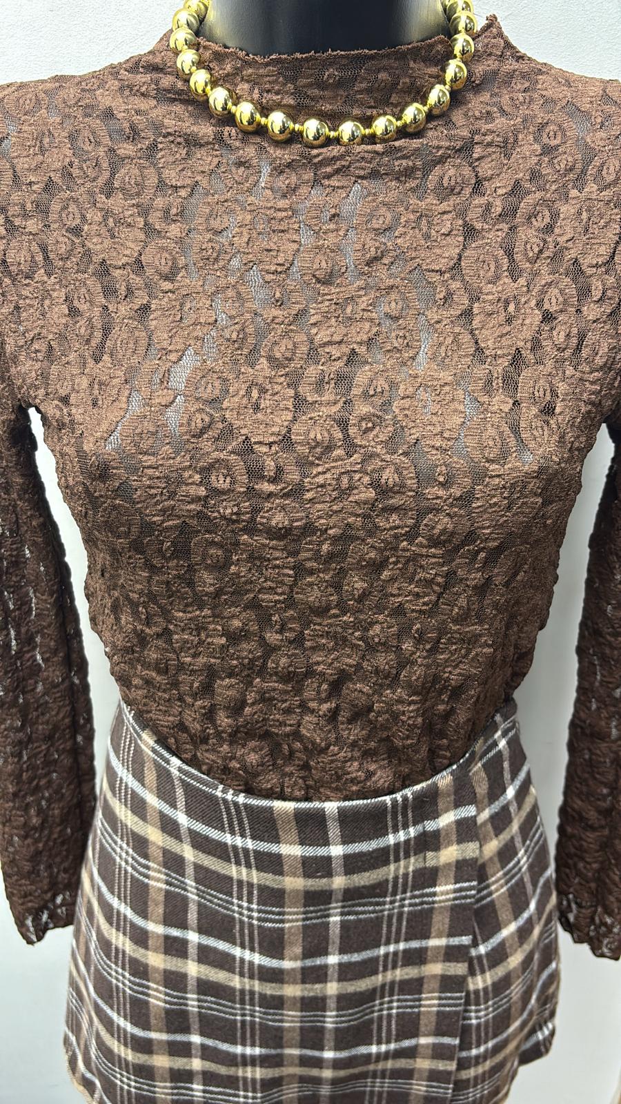 Maglia in pizzo elasticizzata