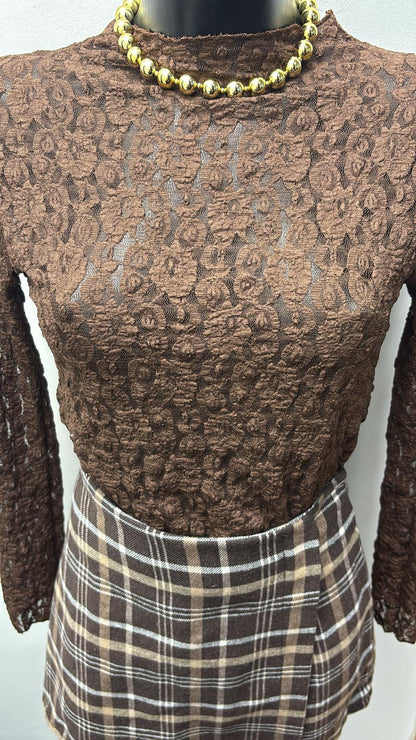 Maglia in pizzo elasticizzata