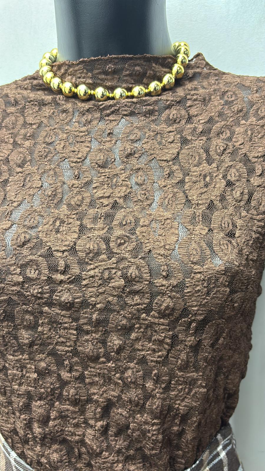 Maglia in pizzo elasticizzata