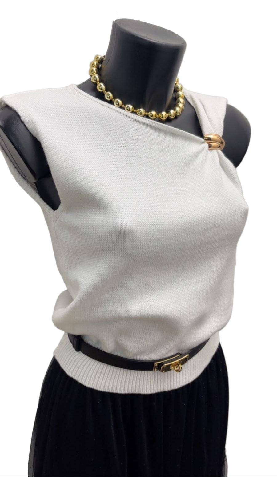 Maglia asimmetrica con dettaglio in oro